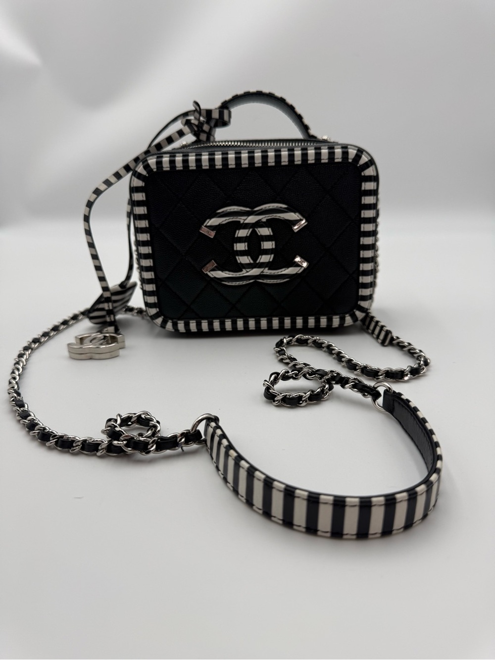 Chanel black and white filigree vanity bag in caviar leather